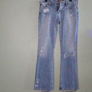 Hollister Women's Button Fly Bootcut, Ripped Jeans. Not new. Just legendary.